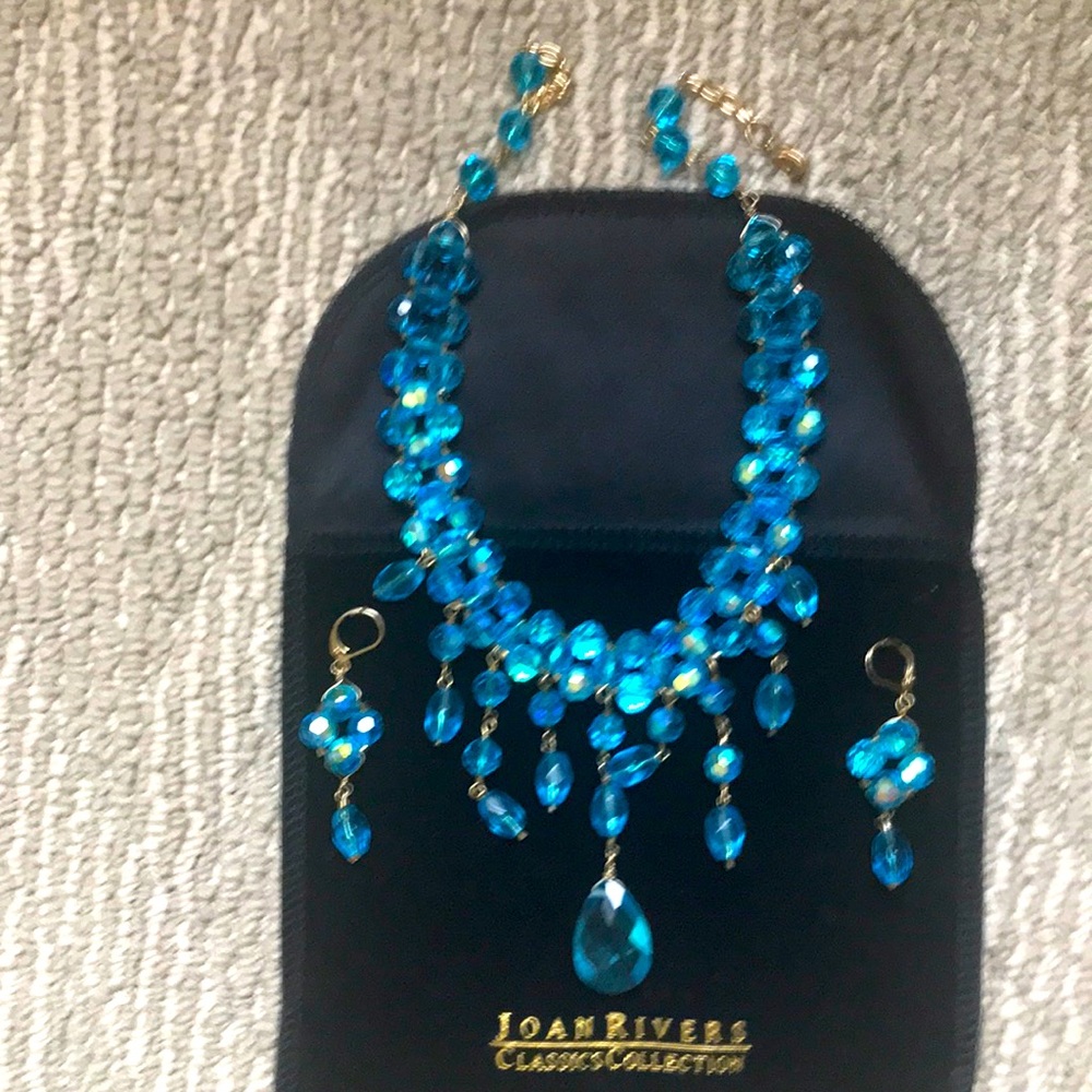 Joan Rivers blue/gold beaded necklace and matching earrings.